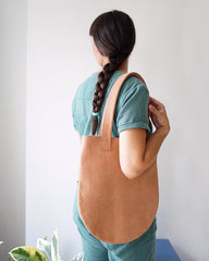 Leather shoulderbag in the colour terracotta by Renske Versluijs